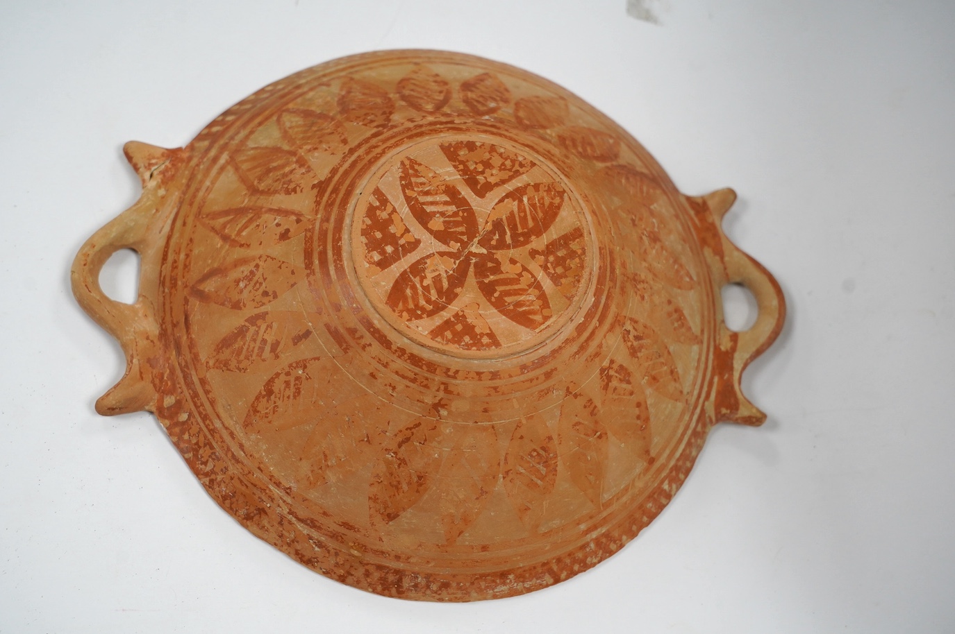 An Ancient Greek terracotta two-handled dish, circa 5th/4th century BC. Condition - good restored condition